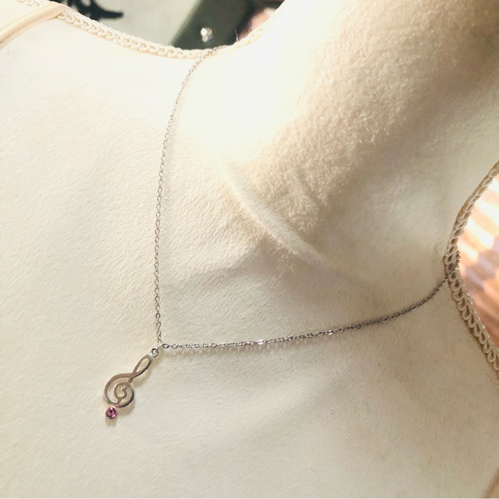 Handcrafted pink rhinestone accent music note pendant on chain necklace